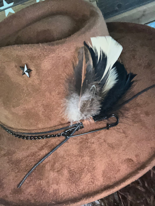 Brown  vegan suede rancher cowboy hat leather rope,black chain band with small leaf charms bold feathers and black safety pin and silver star pin in the crown