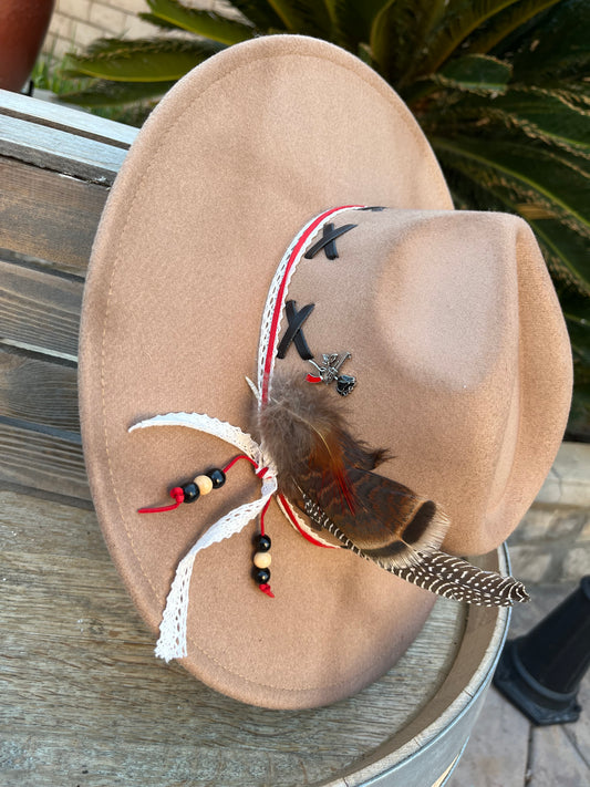 Brown Felt Fedora Hat with Handcrafted Western Elegance has a crisscross stitch and distressed look along with a beautiful band and feathers